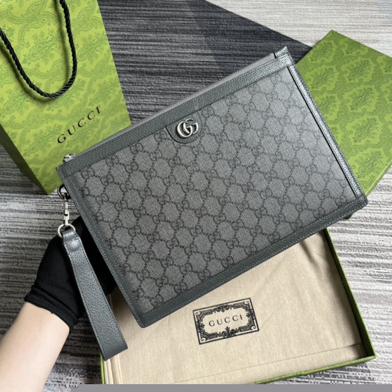 G*u*i clutch bags